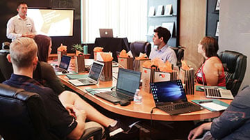 Founder presenting a product to a small team